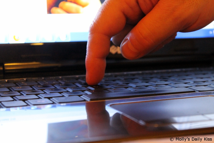 Finger on keyboard internet friendship